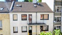 Bild (065b7edb560f40be963e57e0e374b2ad): Zinshaus 
