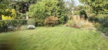 Garten Doppelhaush�lfte  Gartengl�ck  in Holten